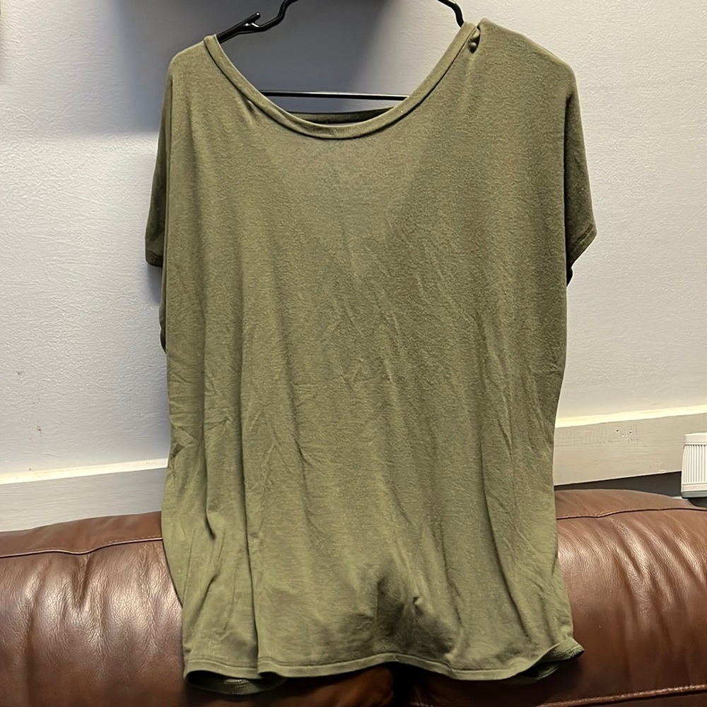 Express shirts one in green and pink has a knot on the back of shirt on bottom
